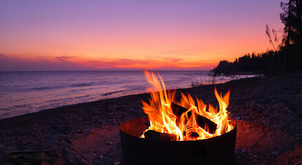 beautiful campfire in the middle of a nice beach