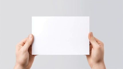 Hands holding blank paper isolated on white background. Generative AI.