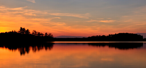 Fototapeta premium sunset over lake