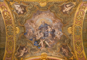 Fototapeta na wymiar GENOVA, ITALY - MARCH 5, 2023: The fresco of Holy Trinity among the angels in the church Chiesa di Santa Maria Maddalena by Giacomo Antonio Boni (1688 – 1766).