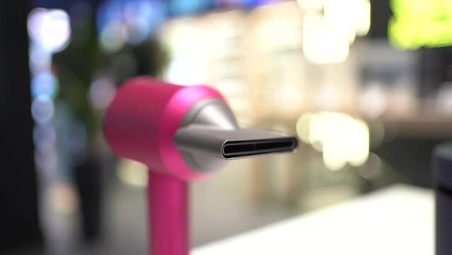 Supersonic hair dryer and beauty tool with soft focus