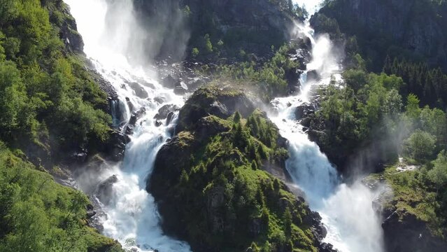 Drone footage of the majestic Latefossen Waterfall in Norway during summer