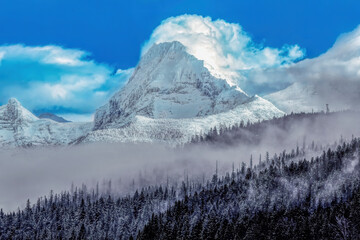 majestic mountain peak in winter, Glacier National Park, Montana