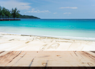 Fototapeta na wymiar beach wood table or wood floor with sea landscape beach background for product display