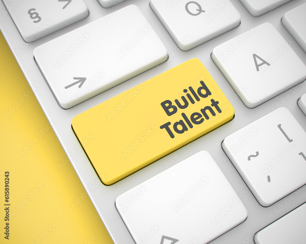 Poster up close of build talent keyboard yellow keypad. slim aluminum keyboard key showing the textbuild ta