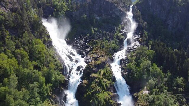 Drone footage of the majestic Latefossen Waterfall in Norway during summer