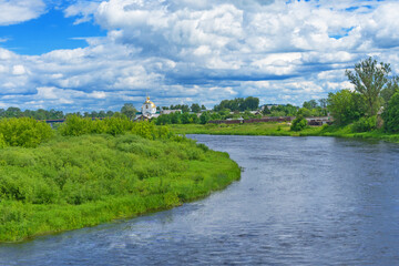 Landscape with a church, a river and a bridge. Middle-Russian strip. Summer. City Island