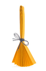 Orange broom of origami, isolated on white background.