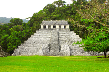 Fototapeta na wymiar Temple of the Inscriptions - mesoamerican stepped pyramid structure at the pre-Columbian Maya civilization, Palenque, Chiapas, Mexico. UNESCO world heritage site