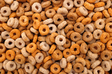 Multigrain hoops breakfast cereal - rings of wheat, barley, rice, oats and maize - as an abstract...