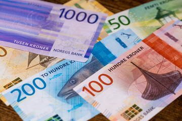 Norwegian money lying on the table, Norway currency, Finance and home budget concept, Flat...