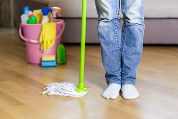 woman holding mop in the home. concept cleaning