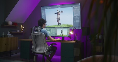 Young 3D designer creates animation for video game character, works remotely from home late night...