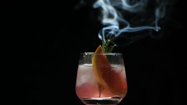 Gin and tonic with grapefruit and smoking rosemary. The recipe is fresh and sweet, at the same time a bit tart. Bon Appetit!