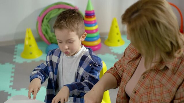 Unlocking Potential Empowering Children with Autism through Speech Therapy Learning and Development with a Skilled Speech Pathologist. High quality 4k footage