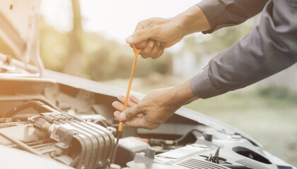 Automobile mechanic repairman hands repairing a car engine automotive workshop with a wrench, car service and maintenance,Repair service.