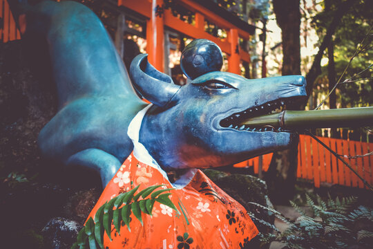 Fox purification fountain at Fushimi Inari Taisha torii shrine, Kyoto, Japan