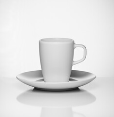 White espresso cup on white background