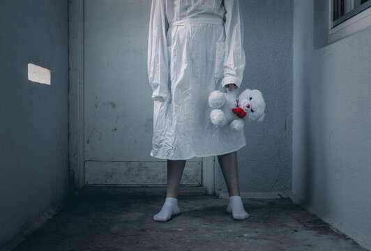 Mentally Ill Girlwith A Straitjacket In A Psychiatric