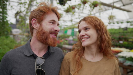 Redhead Couple Standing Inside Green Environment, Portrait Faces of Happy Red-Haired Man and Woman in Their 30s