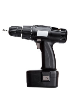 Black cordless drill with battery and drill bit on white background