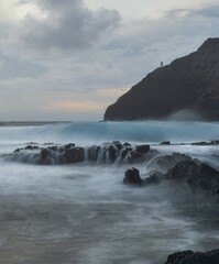 Hawaii long exposure by the rocks and lighthouse