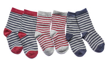 Set of striped socks on white background