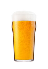 Cold glass of lager beer with foam and dew isolated on white background