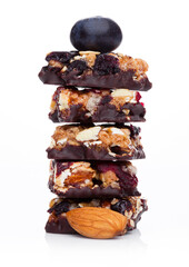 Healthy cereal bar with almonds and blueberries on white background