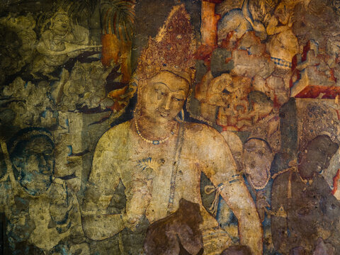 The 5th-century Bodhisattva Padmapani painting depicting the Buddha holding a lotus flower at Ajanta caves, Maharashtra, India.
