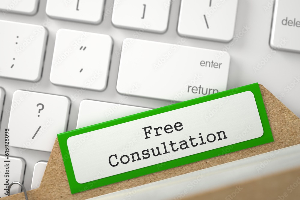 Poster free consultation written on green sort index card lays on white pc keyboard. closeup view. selectiv