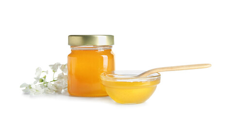 Bowl and jar of honey with flowers of acacia on white background