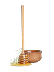 Bowl of acacia honey and dipper on white background