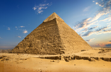 Fototapeta na wymiar Egyptian pyramids in sand desert and clear sky
