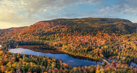 Perfect end of the day - Maine  - New England fall foliage with sunset autumn colors on the pond 