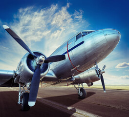 Fototapeta premium historical aircraft on a runway is waiting for take off