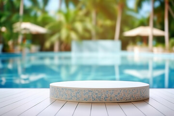 Empty white ceramic mosaic table top and blurred swimming pool 