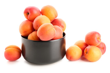 Bowl with ripe apricots isolated on white background