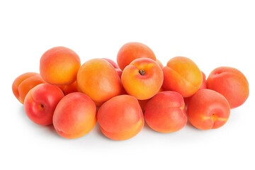 Heap of ripe apricots isolated on white background