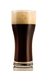 Dark beer in a glass, isolated on a white background.