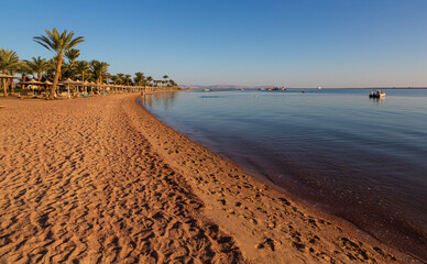 Dahab, Egypt - January 2022: View of the sand beach and Red Sea