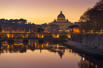 Fototapeta na wymiar Travel to Italy: Rome Vatican St.peter basilica after sunset view of river Tiber and Saint Angelo bridge