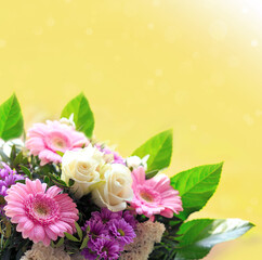 Colorful flowers bouquet isolated on yellow background. Mother's Day card.