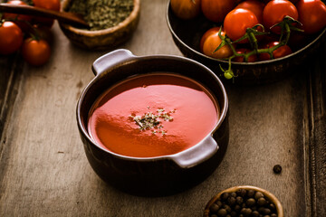 Tomato soup. Homemade tomato soup with tomatoes, herbs and spices. Comfort food.