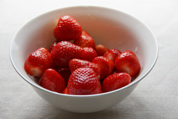 first strawberry harvested in his garden. selective focus .