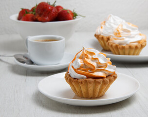 cream basket cup of coffee and fresh strawberries. set . selective focus 