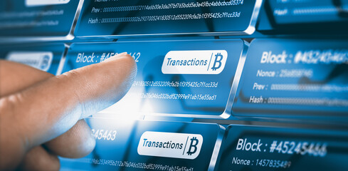 Finger pressing a blockchain block with the text transaction, a bitcoin symbol and security sha256 algorithm hach. Composite between a hand photography and a 3D background - Powered by Adobe