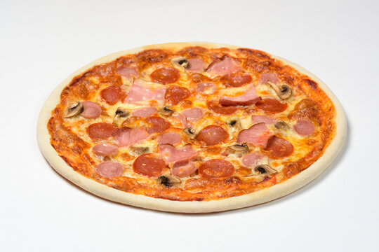 Pizza with Bavarian sausage, cervelat, carbonate, mushrooms, mozzarella cheese on white background