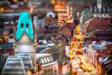 Winchester city view at night with Christmas market stalls in the high street