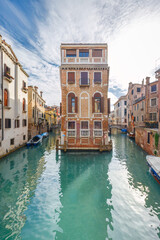 The canals with historic buildings in Venice, Italy, Europe.